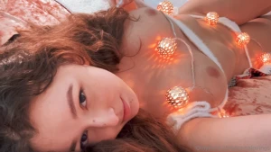 Wrapped in fairy lights imagining your touch ignites me