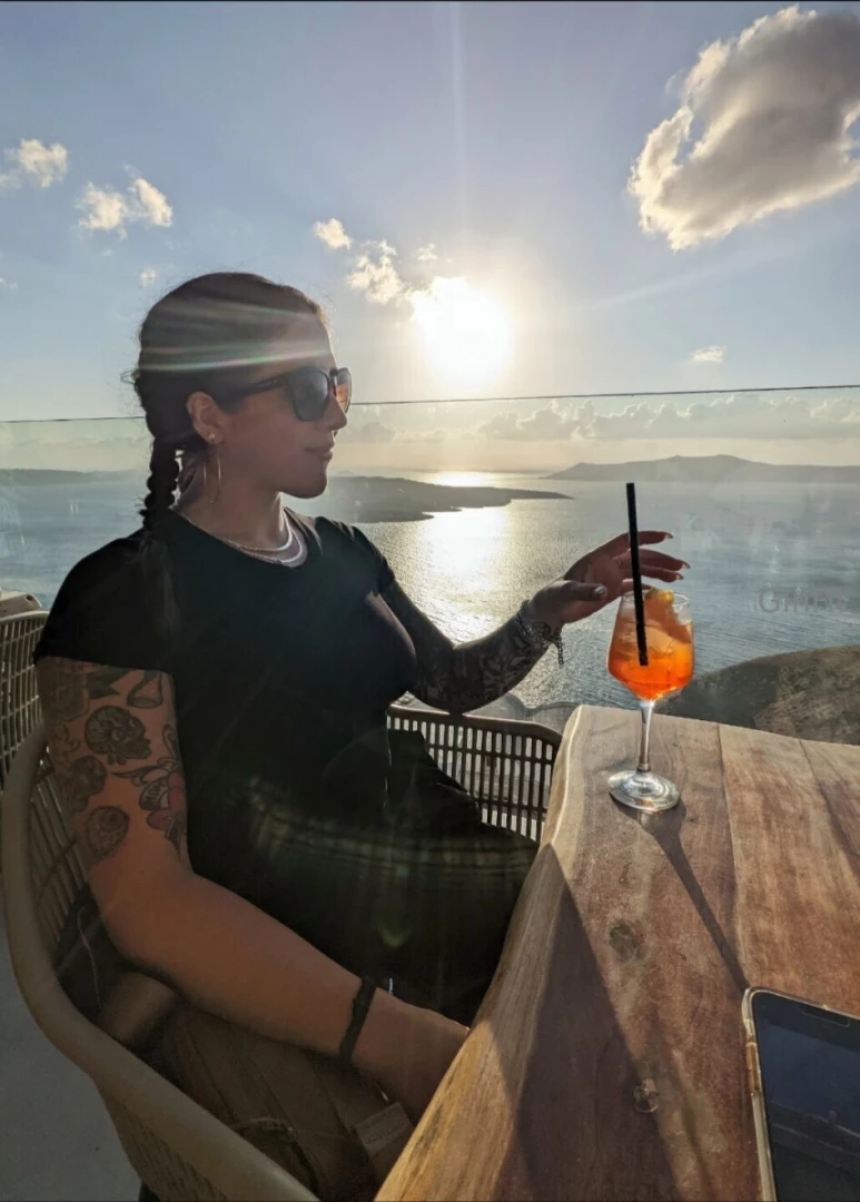 Throwback to santorini a couple years ago an aperol spritz tastes a 