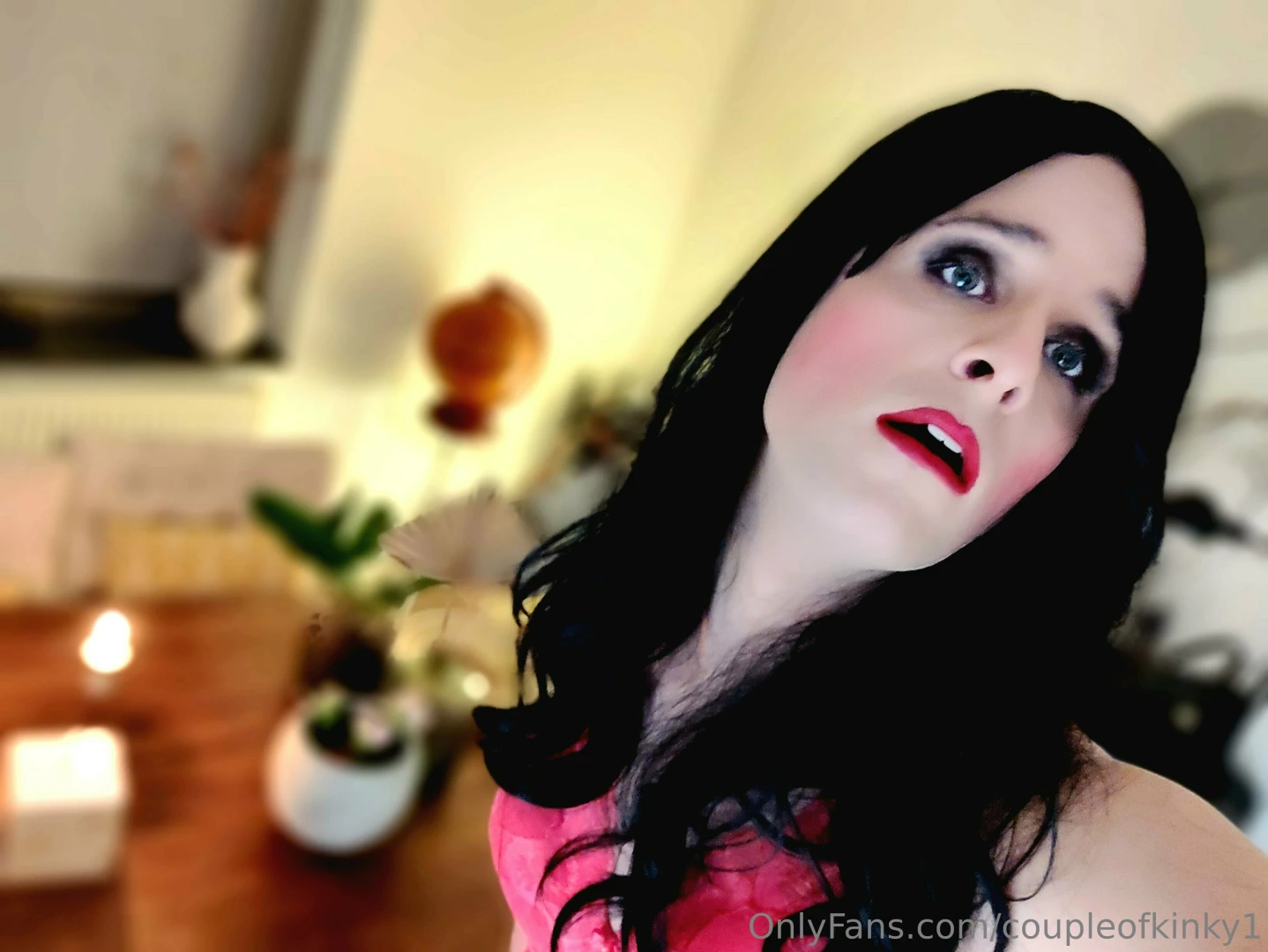 Pink bra long lashes and red lips ready for a hot night 