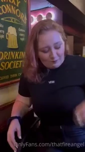 Me flashing my boobs at the bar part 3
