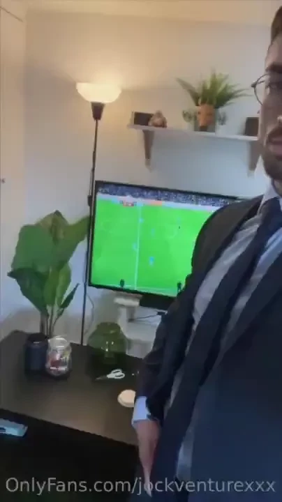 Suited wank whilst watching football after work w cumshot damn my 