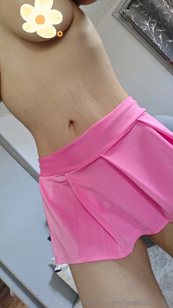 Showing off my ass in my new pretty pink little skirt 