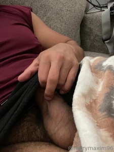 Laying on the couch waiting for a willing mouth