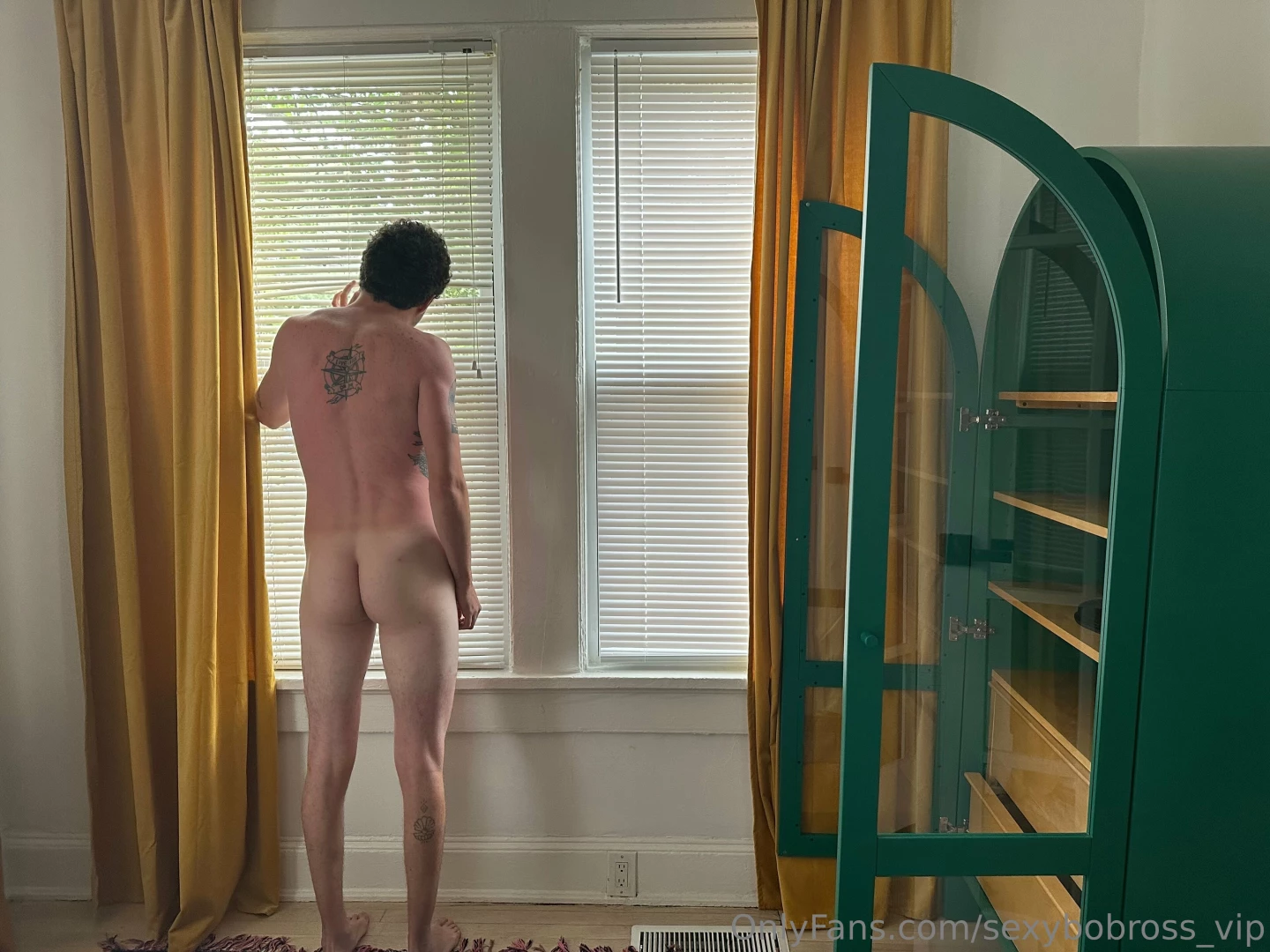 Peaking out the window waiting for you to come ravish me 