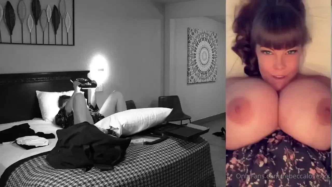 Behind the scenes doing a vertical video in my hotel room laying on 