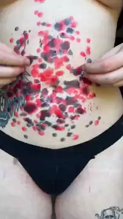 Gently rubbing and groping my belly to remove the pretty red amp black 