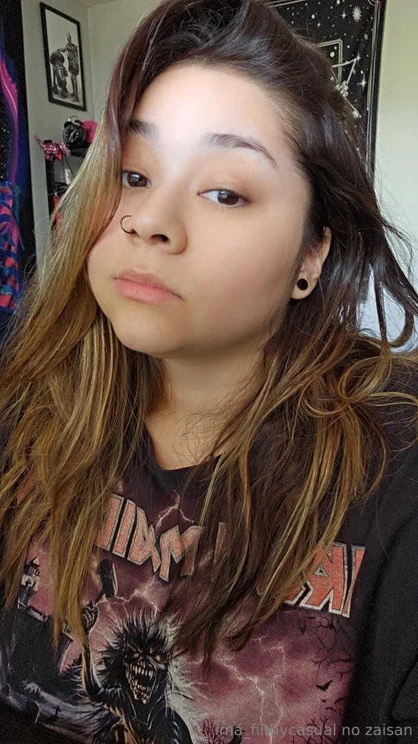 Messy hair honest stare maybe a little too much charm 