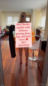 Red hardot sandals with fishnets getting dress legs and back views