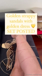 Golden strappy sandals with golden dress