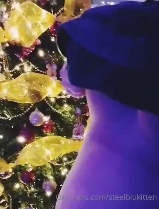 A little tittydroppin by the christmas tree 