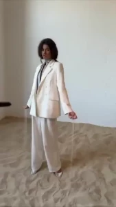 Stylish white suit is the embodiment of elegance purity and modern