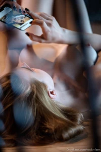 Caught looking at a selfie during a photoshoot