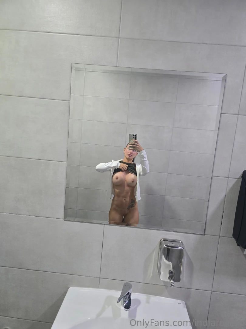 Being a naughty girl in the public gym toilets 