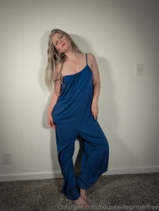 Blue jumpsuit energy confident curvy and a little naughty