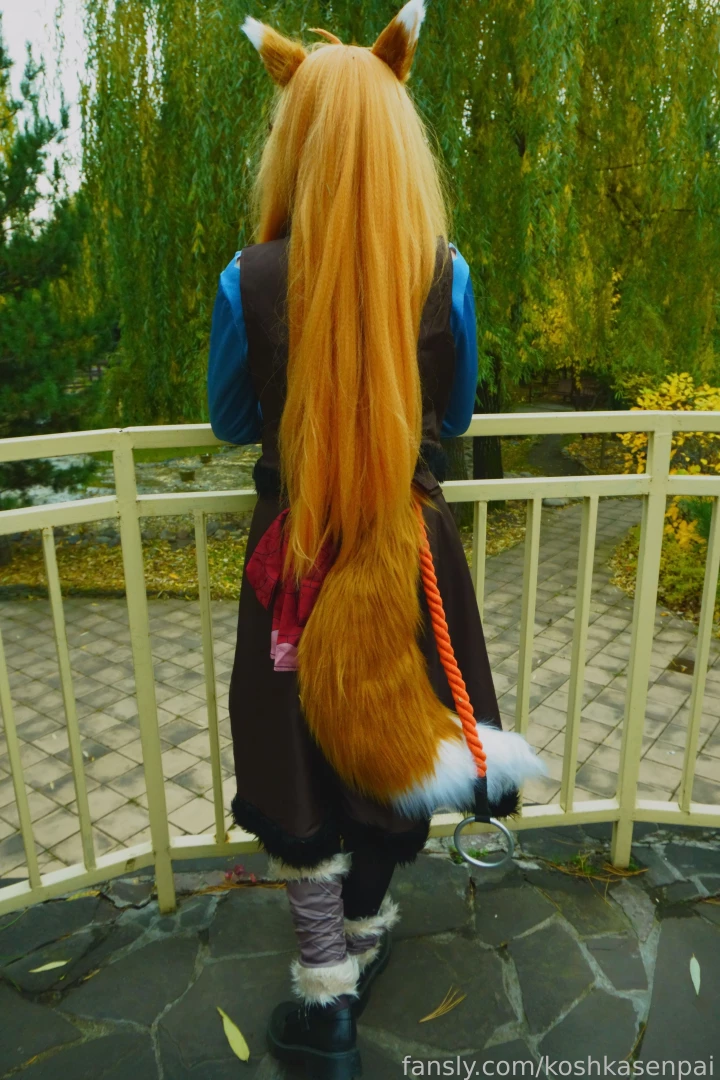 The wise wolf holo comes to people for walk in the park cosplay trans 