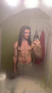 Steam s fogging the mirror but you can still see what you really want