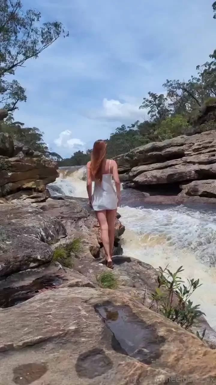Hot days by a windy waterfall 