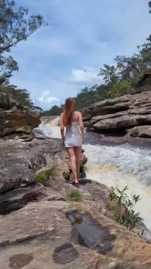 Hot days by a windy waterfall