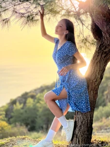 The sun the mountains the beautiful nature and the naked beauty under