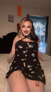 Sitting here in my little black dress but it s barely holding back my