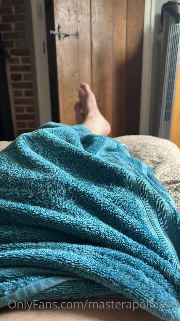 Air drying in a towel on my bed who wants to dry off my feet toe 