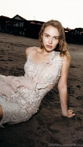 Lying on the beach in this dress and you can t resist can you