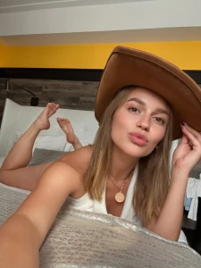 The hat adds a touch of mystery want to find out what s underneath