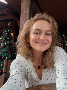 With this smile and the christmas tree behind me the holidays just got