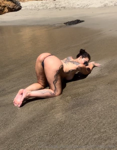 Just posted a video of rain on my vip topless at the beach shaking her