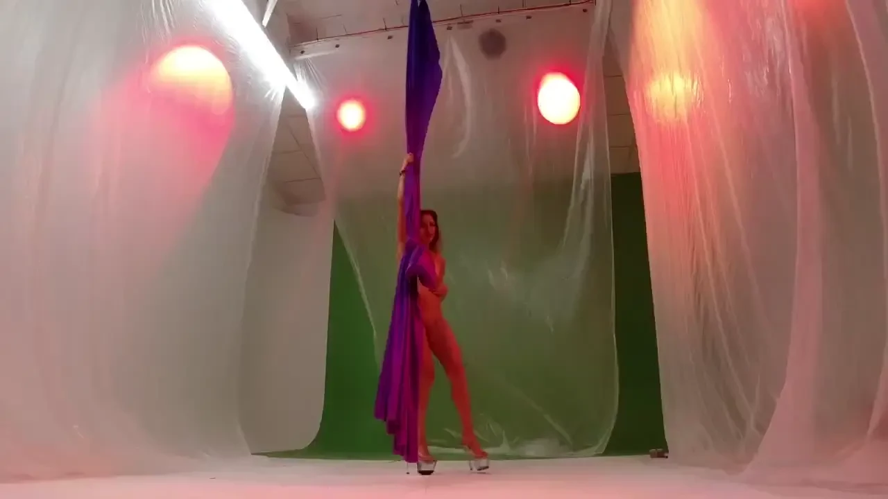 Practicing on silks in my bikini bodybuilding competition suit 