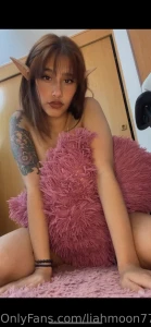 Legs spread fingers swirling on my clit and my vibe purring against my