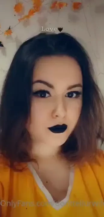 Deep black eyes and black lips 