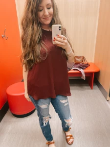 Trying on clothes in the dressing room join me