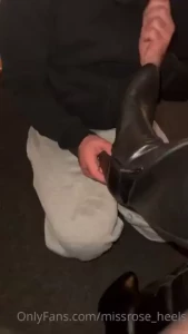 Cleaning those holiday boots with his tongue then taking them off and