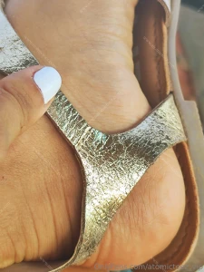 White nails golden skin golden sandals golden sunset and golden muscat