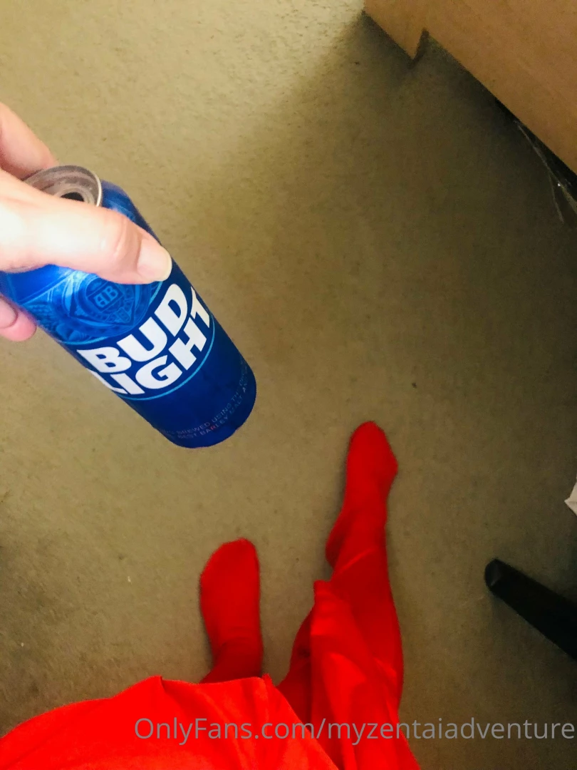 Drinking it up and suiting up before a videocall with a fellow zentai 