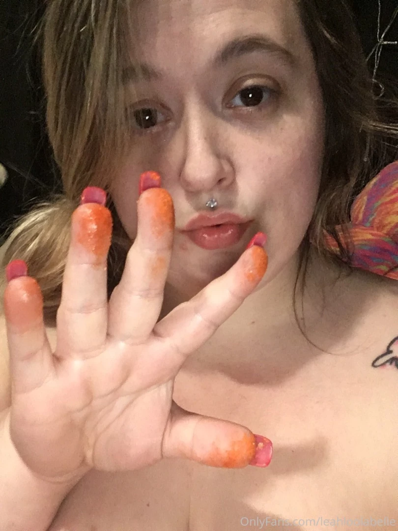 Mmmm enjoying a cheeto popcorn christmas tin gotta say these nails 