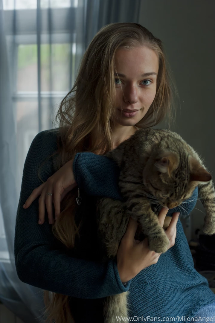 You know how i love cats so i catch and cuddle them everywhere 