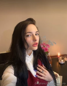 In the ethereal embrace of the midnight hour i emerge a vision swathed