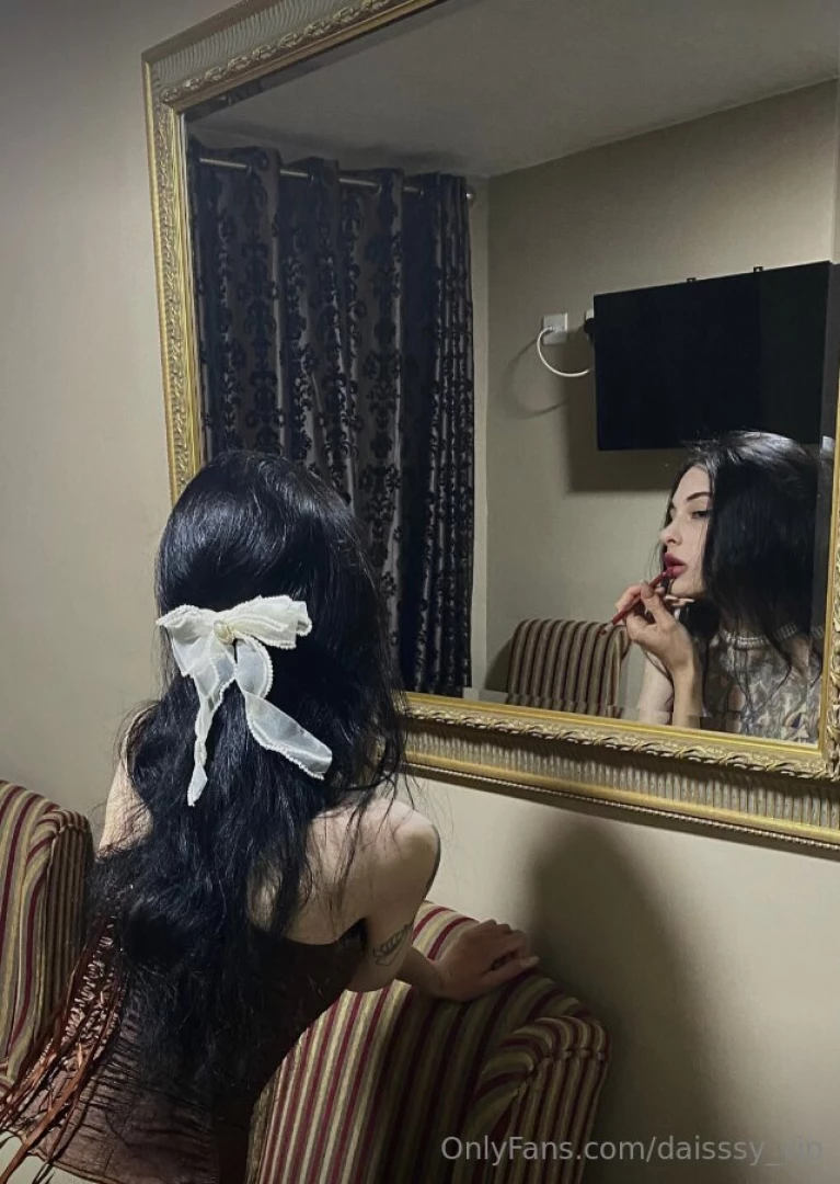 In the reflections of the gothic realm a smile emerges like a 