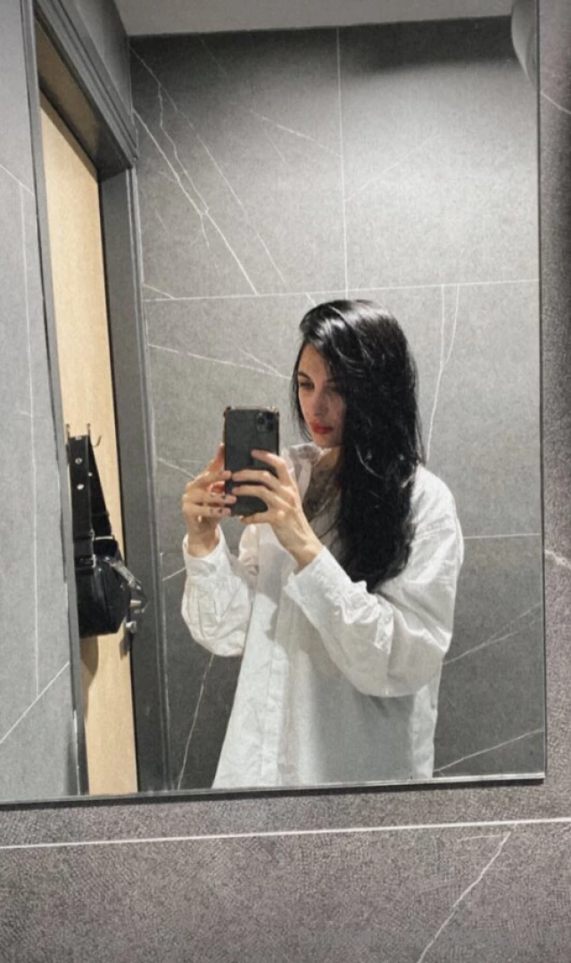 In the gothic mirror s embrace a mysterious smile unveils the hidden 