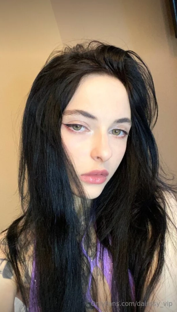 In the veil of midnight my hair cascades like tendrils of darkness 