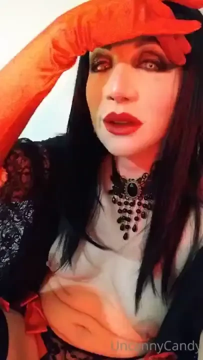 Sophia mask as a brunette with very light eyes caressing and fondling 