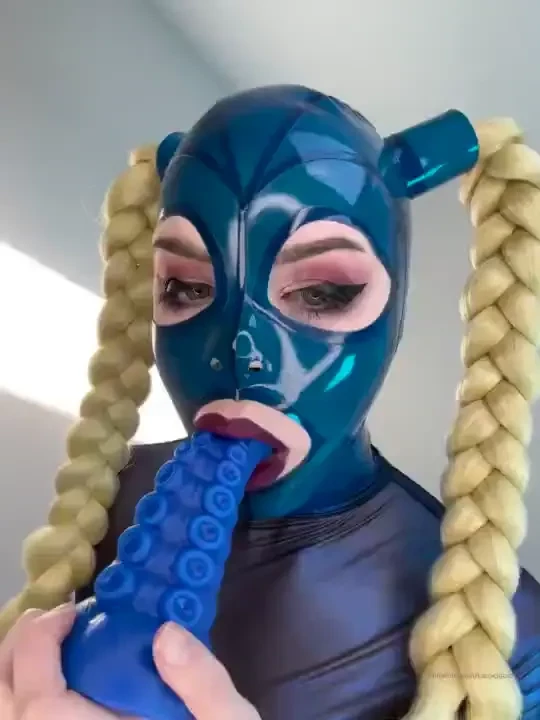 Sloppy latex hood tentacle blowjob really leaning into both the latex 