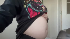 Big bellied goth girl