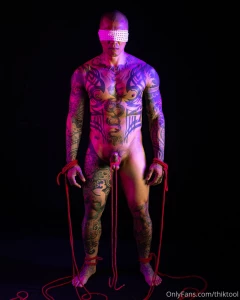 Here s a shot of damianxxxdragon between bondage positions