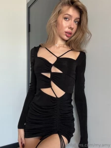 Gorgeous lady in a little black dress with nothing underneath you have