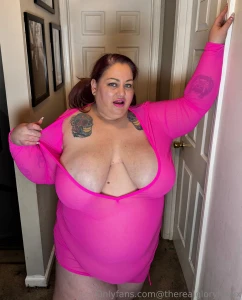 This pink dress is holding on but barely wanna be the reason it ends