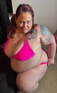 On my knees wrapped in pink and just a little too tempting be honest