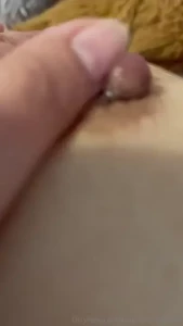 Rubbing cum onto my breast